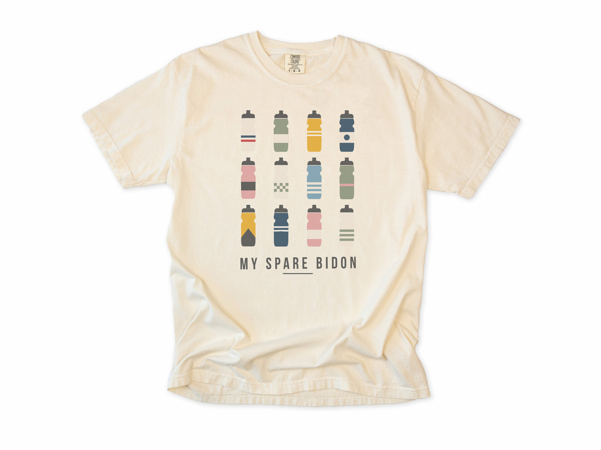 Funny cycling T-shirt in Ivory, 'My Spare Bidon' with twelve colourful water bottles, for cyclists who collect bottles