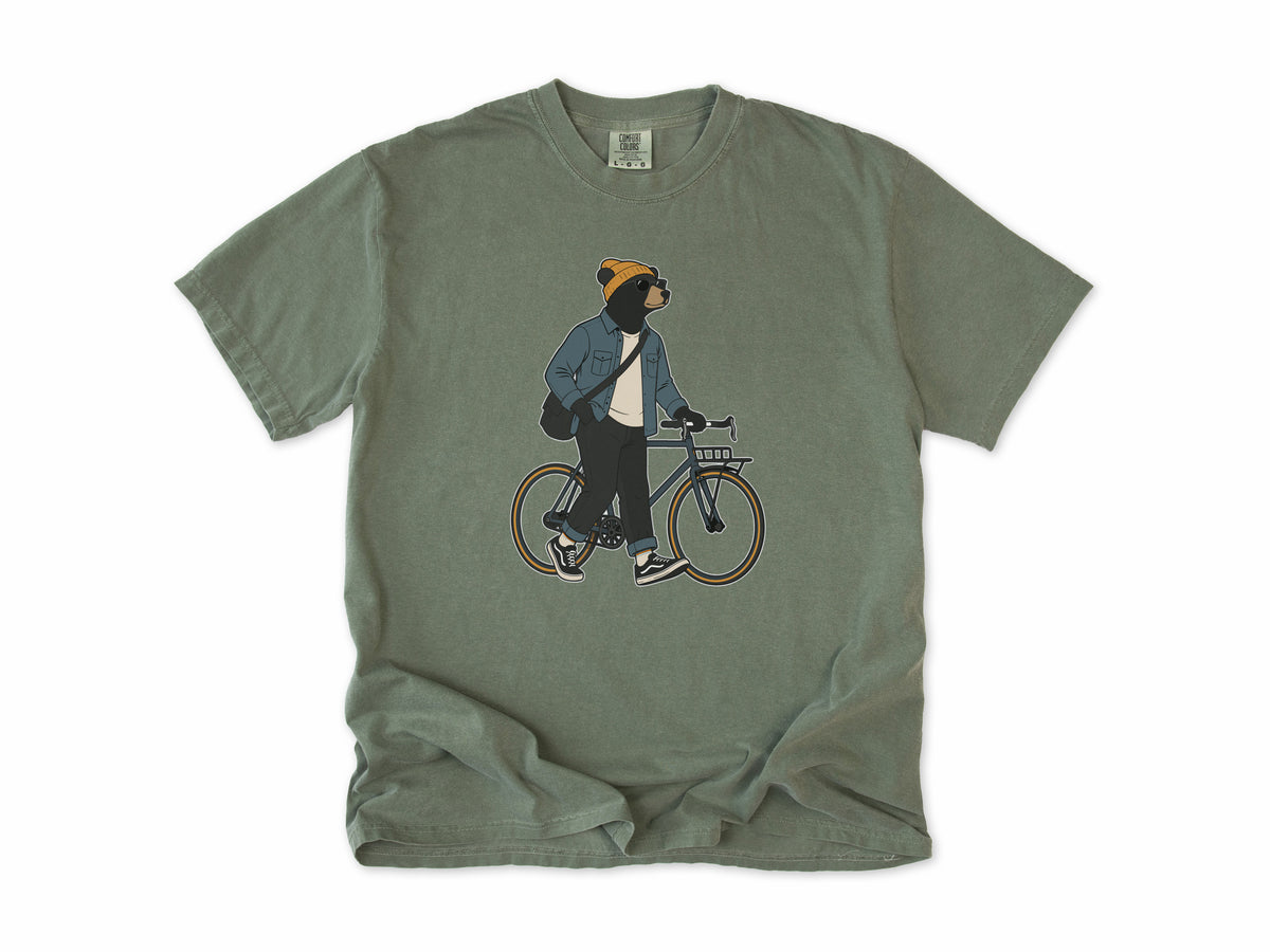 Funny cycling T-shirt in Moss, Casual Bear: a bear in a beanie and denim jacket walking a city bike, for relaxed everyday riders