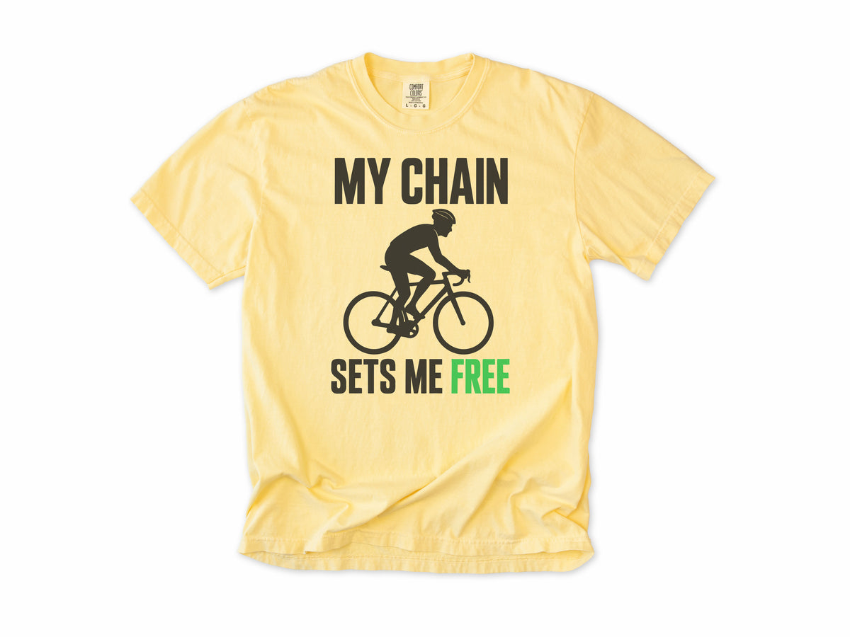 Funny cycling T-shirt in Butter, 'My Chain Sets Me Free' with a cyclist silhouette, for cyclists