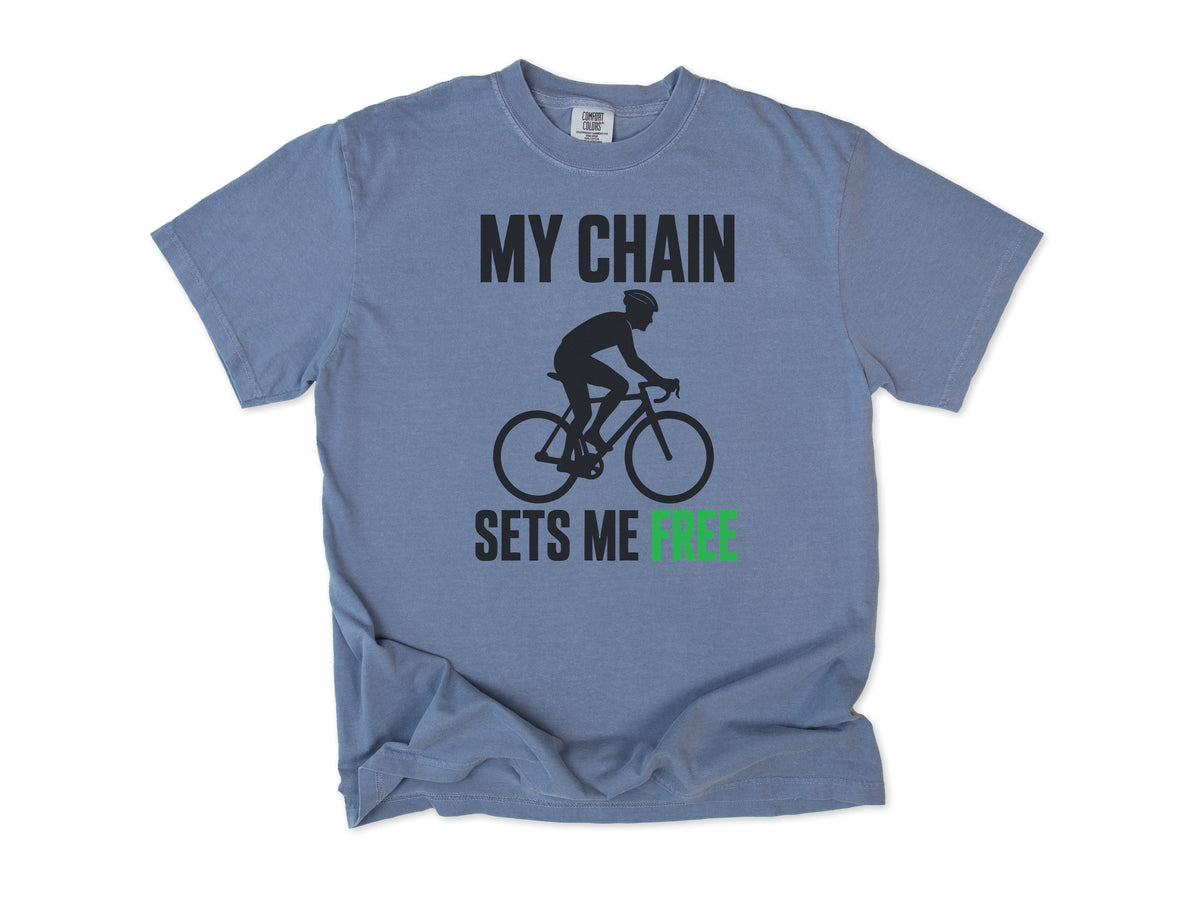 Funny cycling T-shirt in Blue Jean, 'My Chain Sets Me Free' with a cyclist silhouette, for cyclists