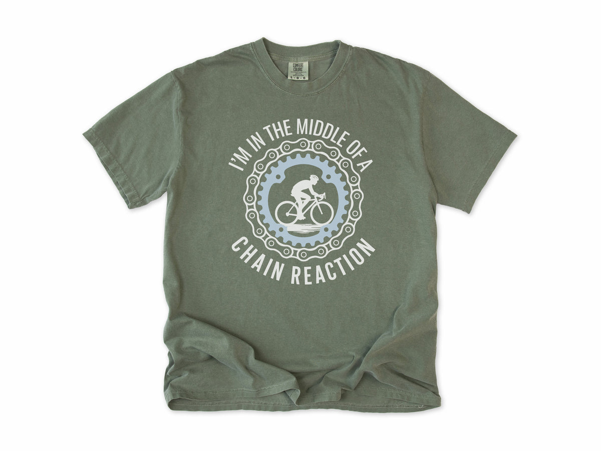 Funny cycling T-shirt in Moss, 'I'm in the middle of a chain reaction', a cyclist in a chainring, for road cyclists