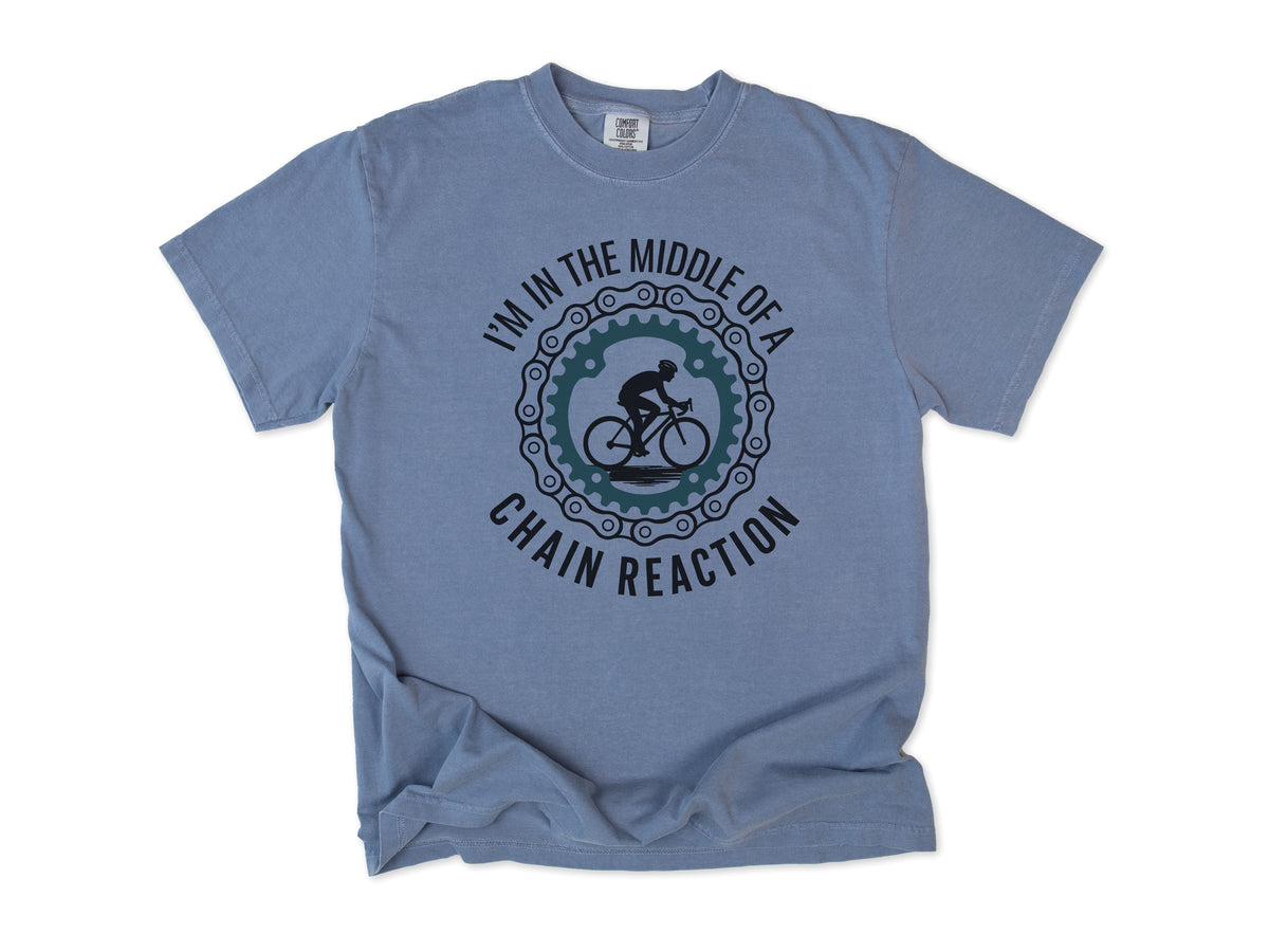 Funny cycling T-shirt in Blue Jean, 'I'm in the middle of a chain reaction', a cyclist in a chainring, for road cyclists