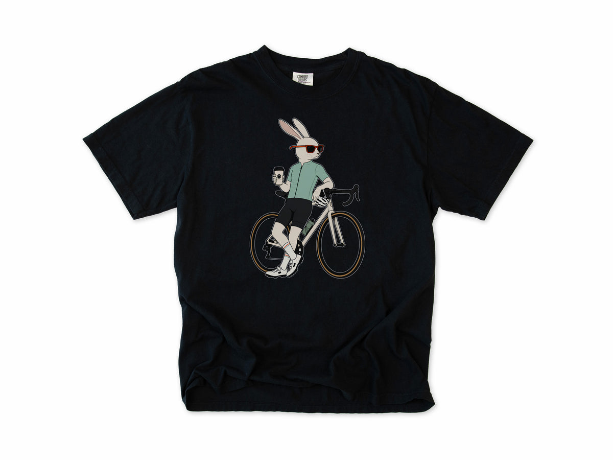 Cycling T-shirt in Black, a hare in sunglasses with a coffee, leaning on a road bike, for coffee-loving road cyclists
