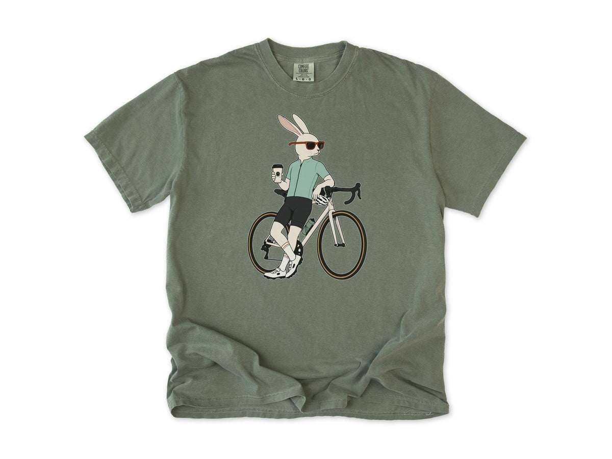 Cycling T-shirt in Moss, a hare in sunglasses with a coffee, leaning on a road bike, for coffee-loving road cyclists