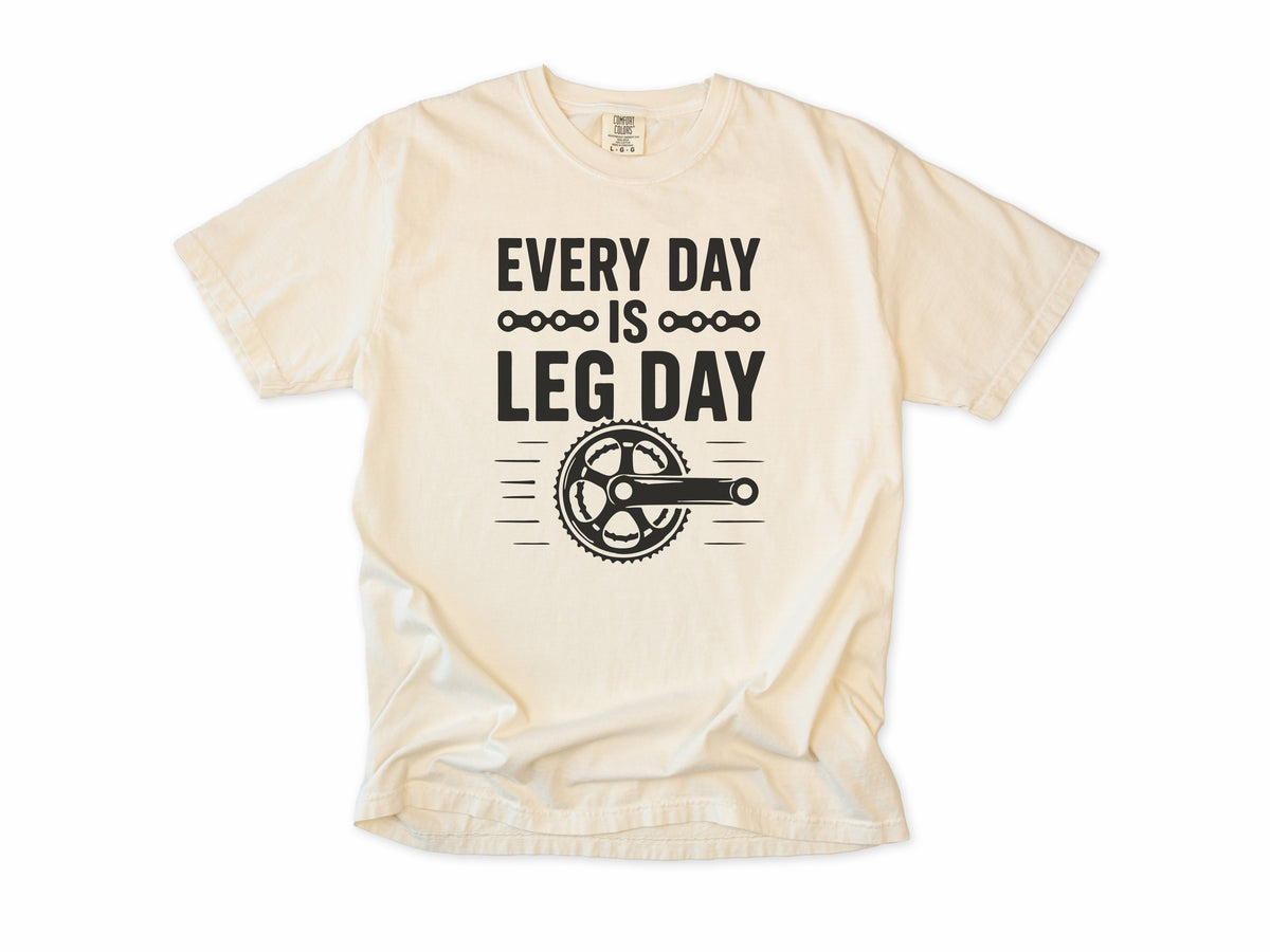 Funny cycling T-shirt in Ivory, 'Every Day Is Leg Day' with a bike crank and chainring, for cyclists