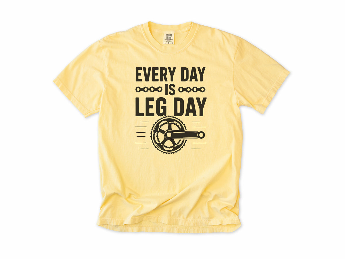 Funny cycling T-shirt in Butter, 'Every Day Is Leg Day' with a bike crank and chainring, for cyclists