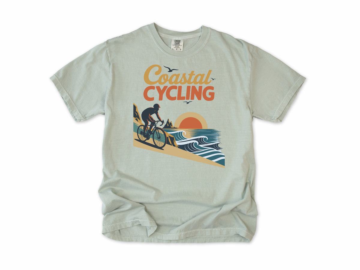 Cycling T-shirt in Bay, 'Coastal Cycling', a cyclist by the sea at sunset, for cyclists who ride the coast