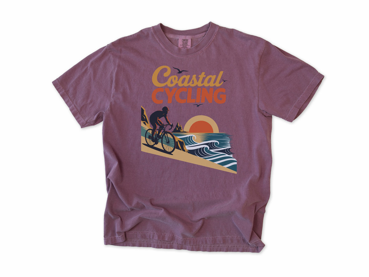 Cycling T-shirt in Berry, 'Coastal Cycling', a cyclist by the sea at sunset, for cyclists who ride the coast