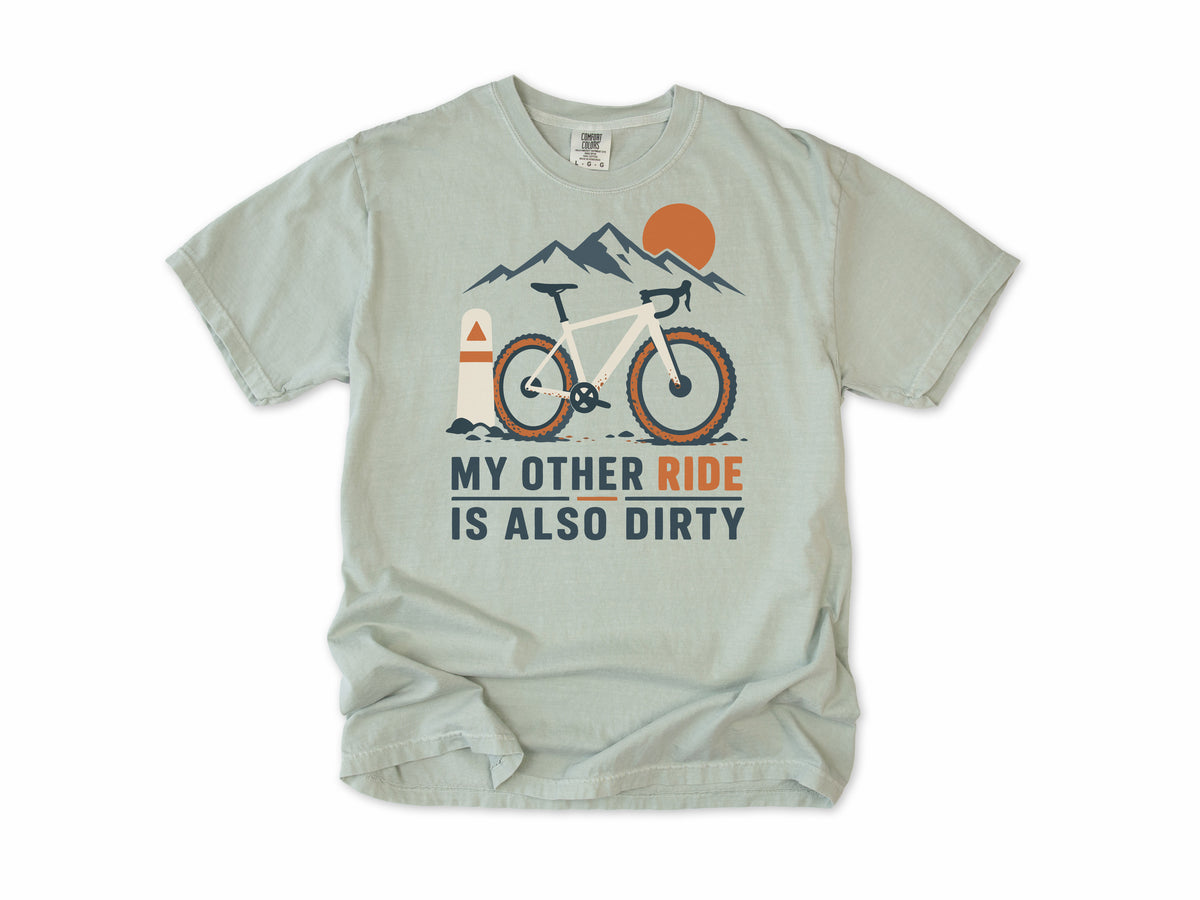 Funny cycling T-shirt in Bay, 'My Other Ride Is Also Dirty' with a gravel bike, for gravel and mountain bikers