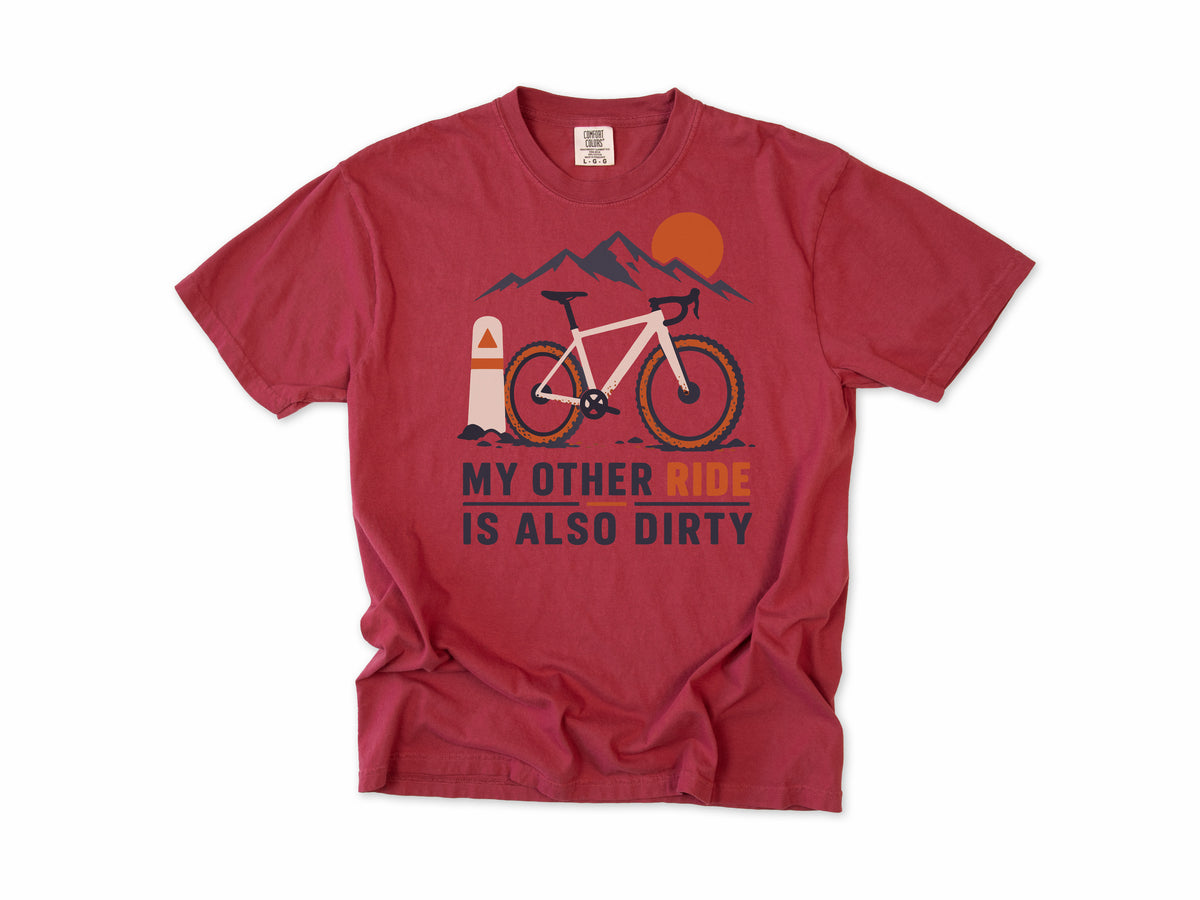 Funny cycling T-shirt in Chili, 'My Other Ride Is Also Dirty' with a gravel bike, for gravel and mountain bikers