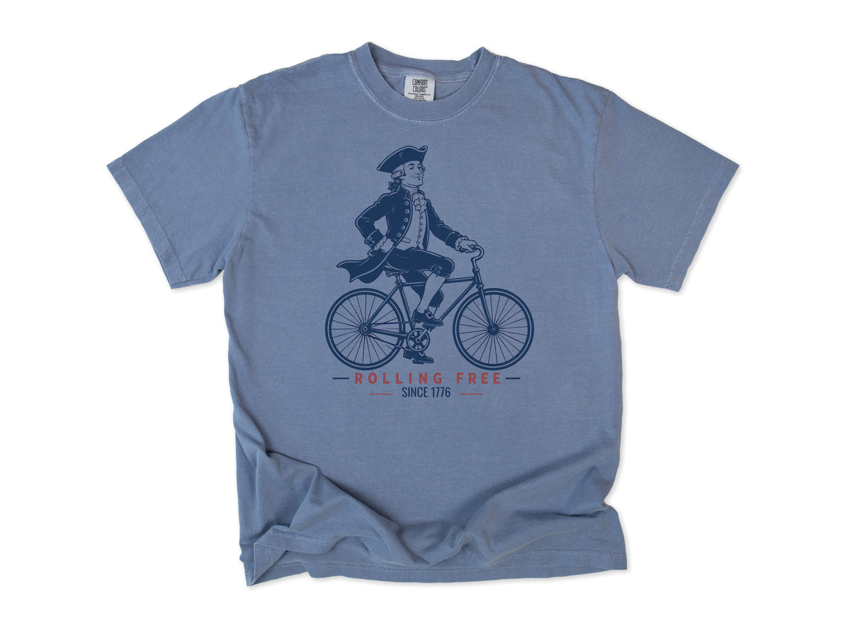 Cycling T-shirt in Blue Jean, Founding Father: a colonial gentleman in a tricorn hat riding a bike, America 250 and 4th of July gift for cyclists