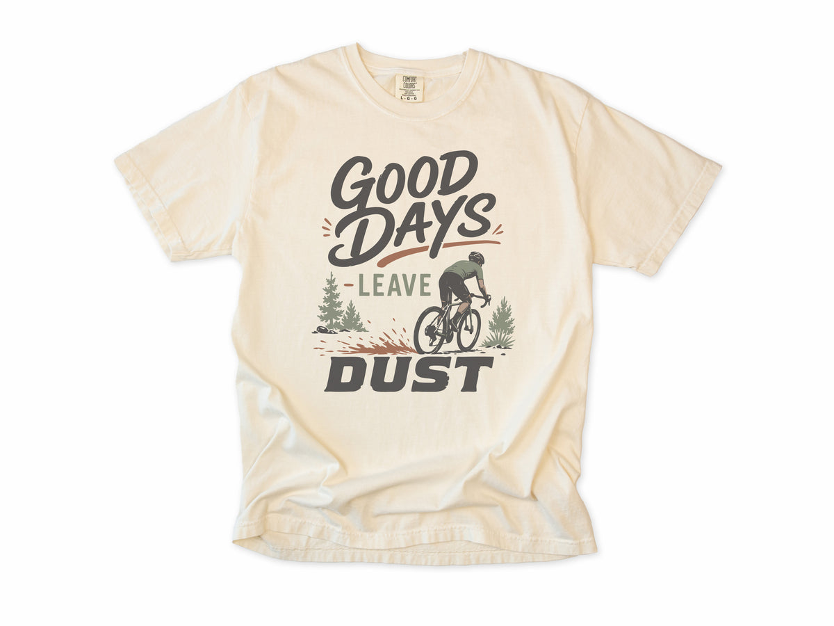 Cycling T-shirt in Ivory, 'Good Days Leave Dust' with a cyclist on a dusty trail, for gravel riders