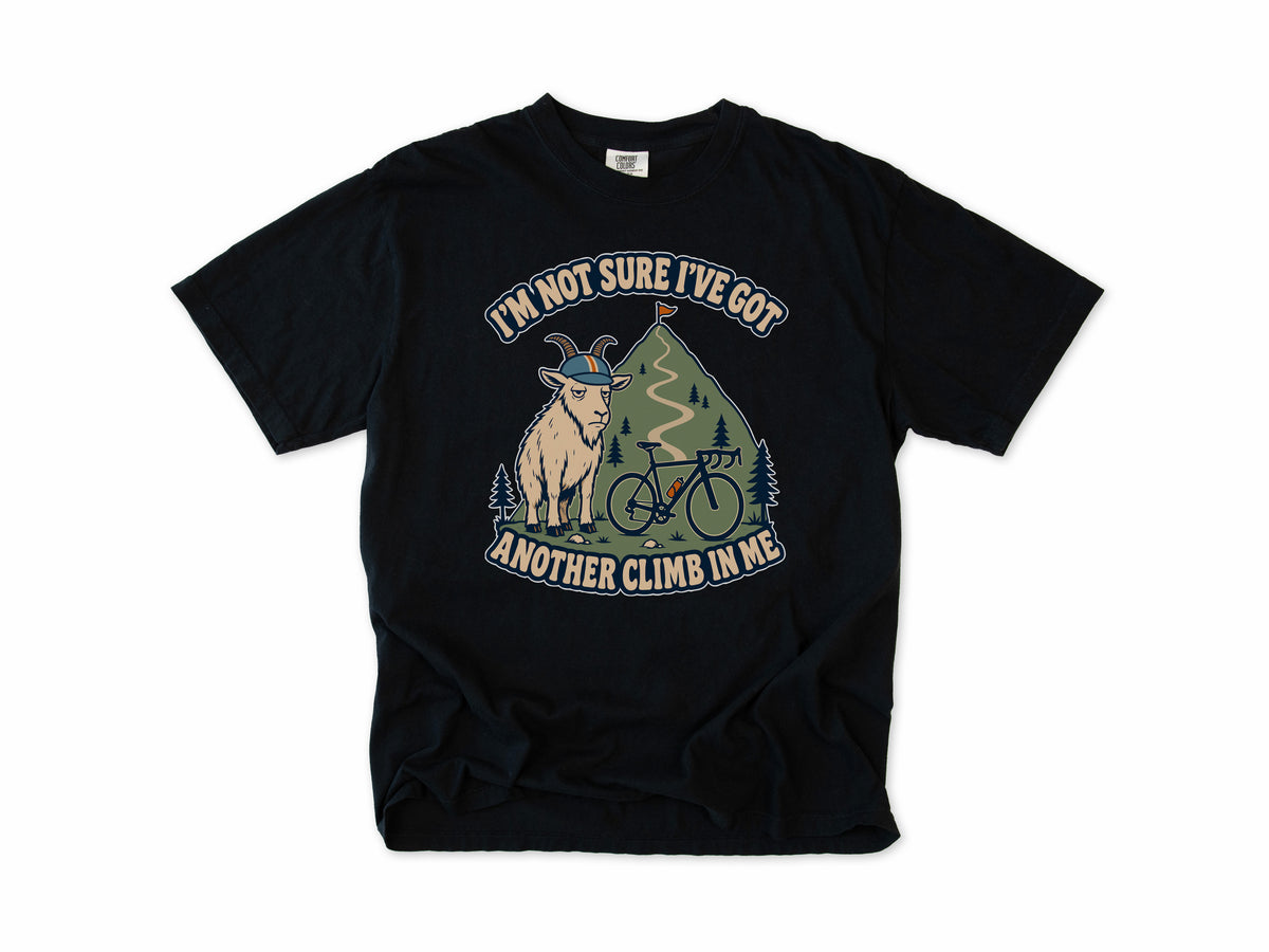 Funny cycling T-shirt in Black, a goat in a helmet with a bike, 'I'm not sure I've got another climb in me', for climbers