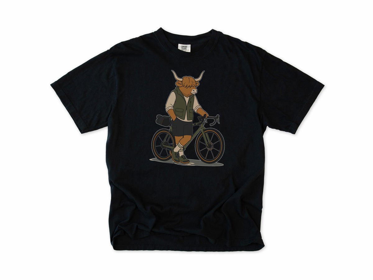 Cycling T-shirt in Black, a Highland cow in a vest standing beside a gravel bike, for gravel riders