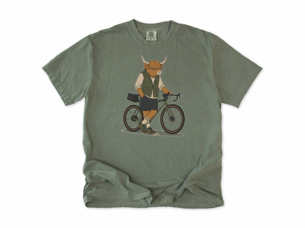 Cycling T-shirt in Moss, a Highland cow in a vest standing beside a gravel bike, for gravel riders
