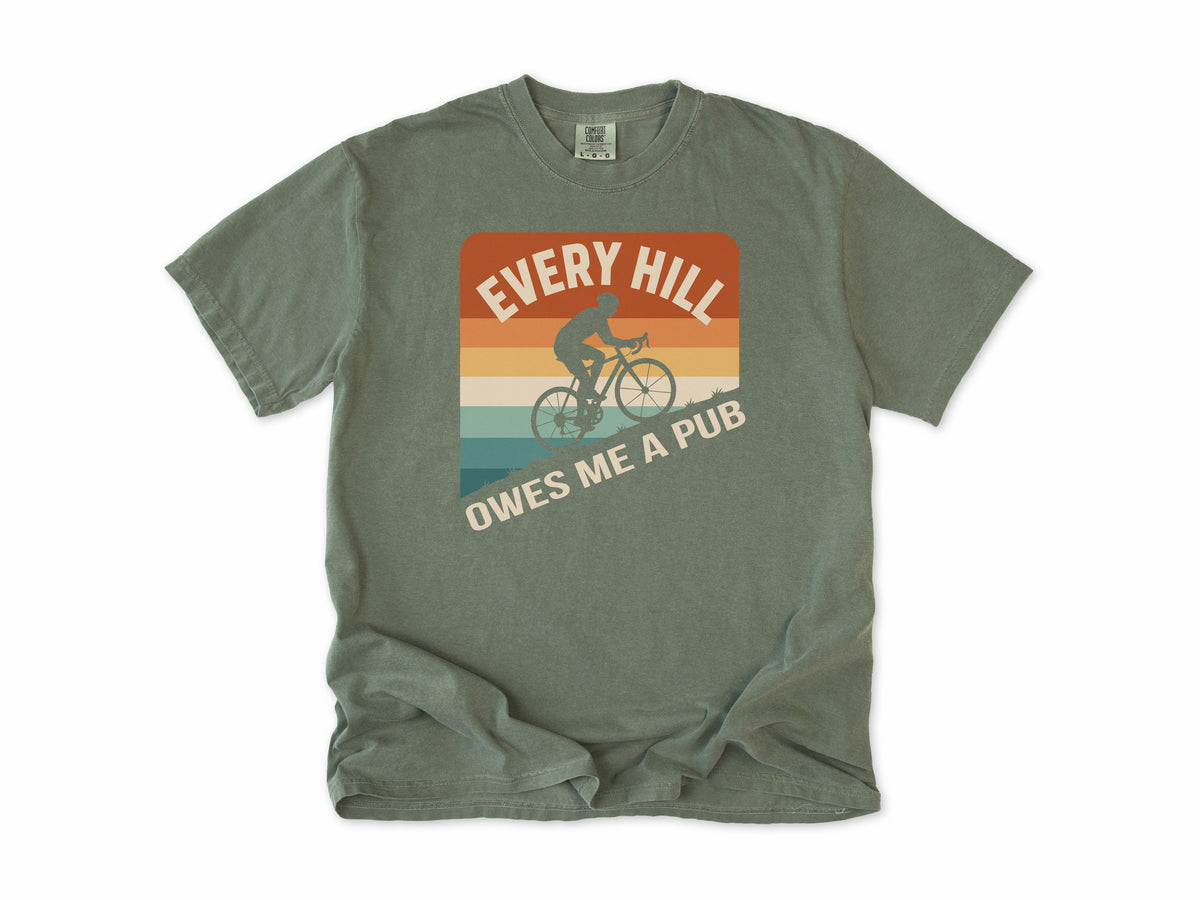 Funny cycling T-shirt in Moss, 'Every Hill Owes Me a Pub', a cyclist on retro stripes, for riders who ride for the pub