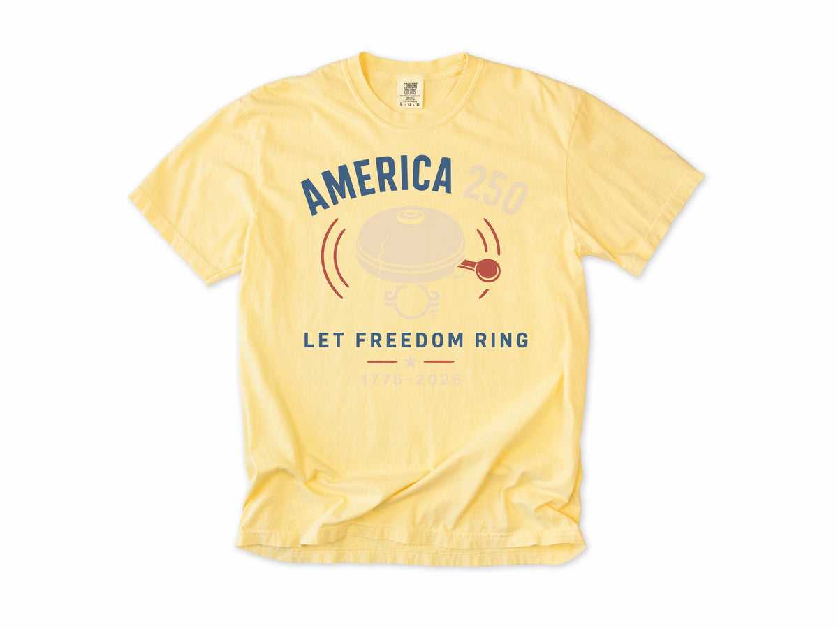 Cycling T-shirt in Butter, a bike bell with 'Let Freedom Ring', America 250 and 4th of July gift for cyclists