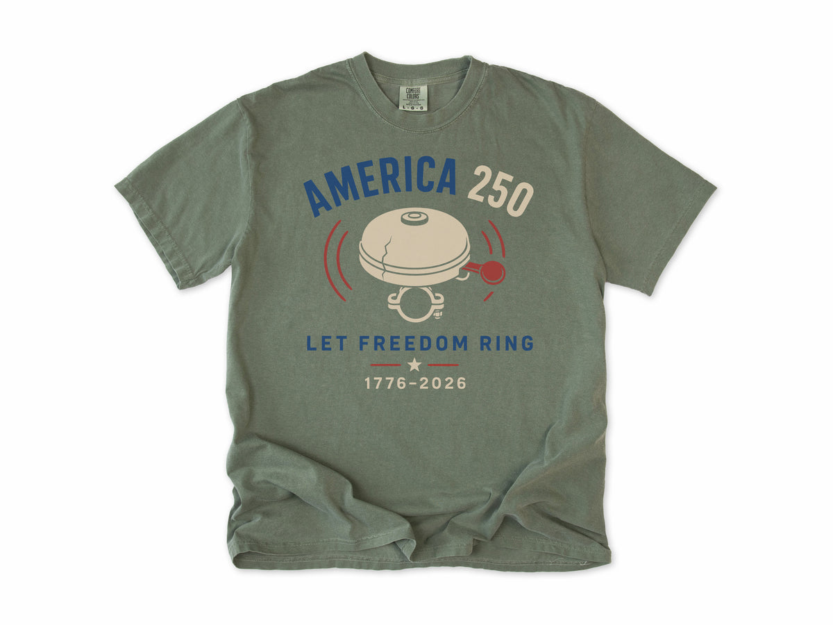 Cycling T-shirt in Moss, a bike bell with 'Let Freedom Ring', America 250 and 4th of July gift for cyclists