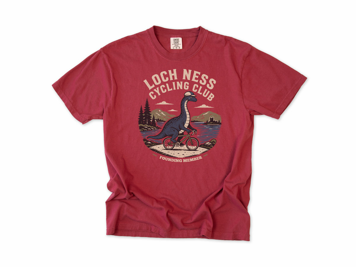 Cycling T-shirt in Chili, 'Loch Ness Cycling Club', a monster riding a bike by a loch, for cycling club members