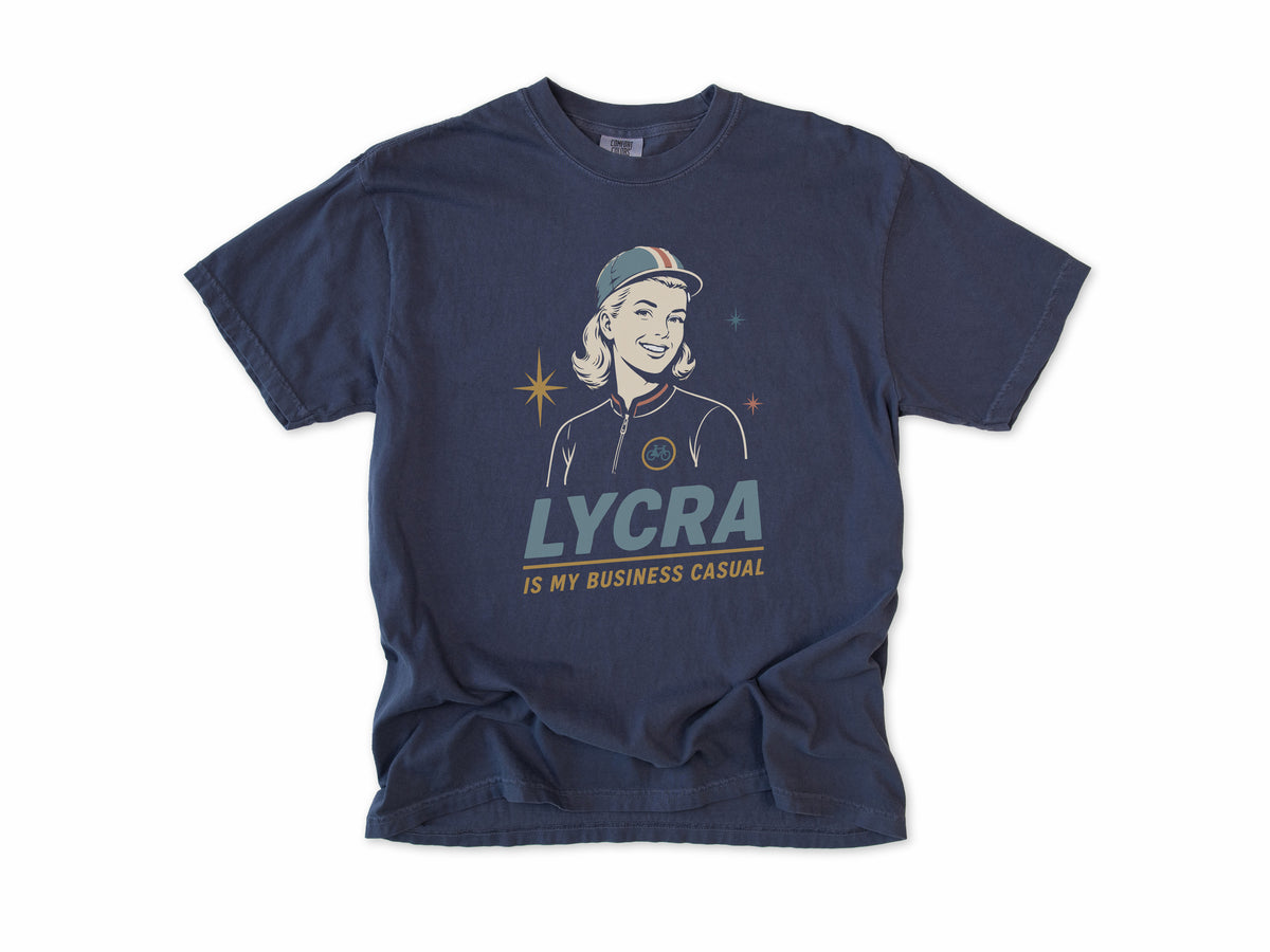 Funny cycling T-shirt in Navy, 'Lycra Is My Business Casual', a retro woman cyclist in a cap, gift for a woman who cycles: mum, wife, sister, daughter, nan