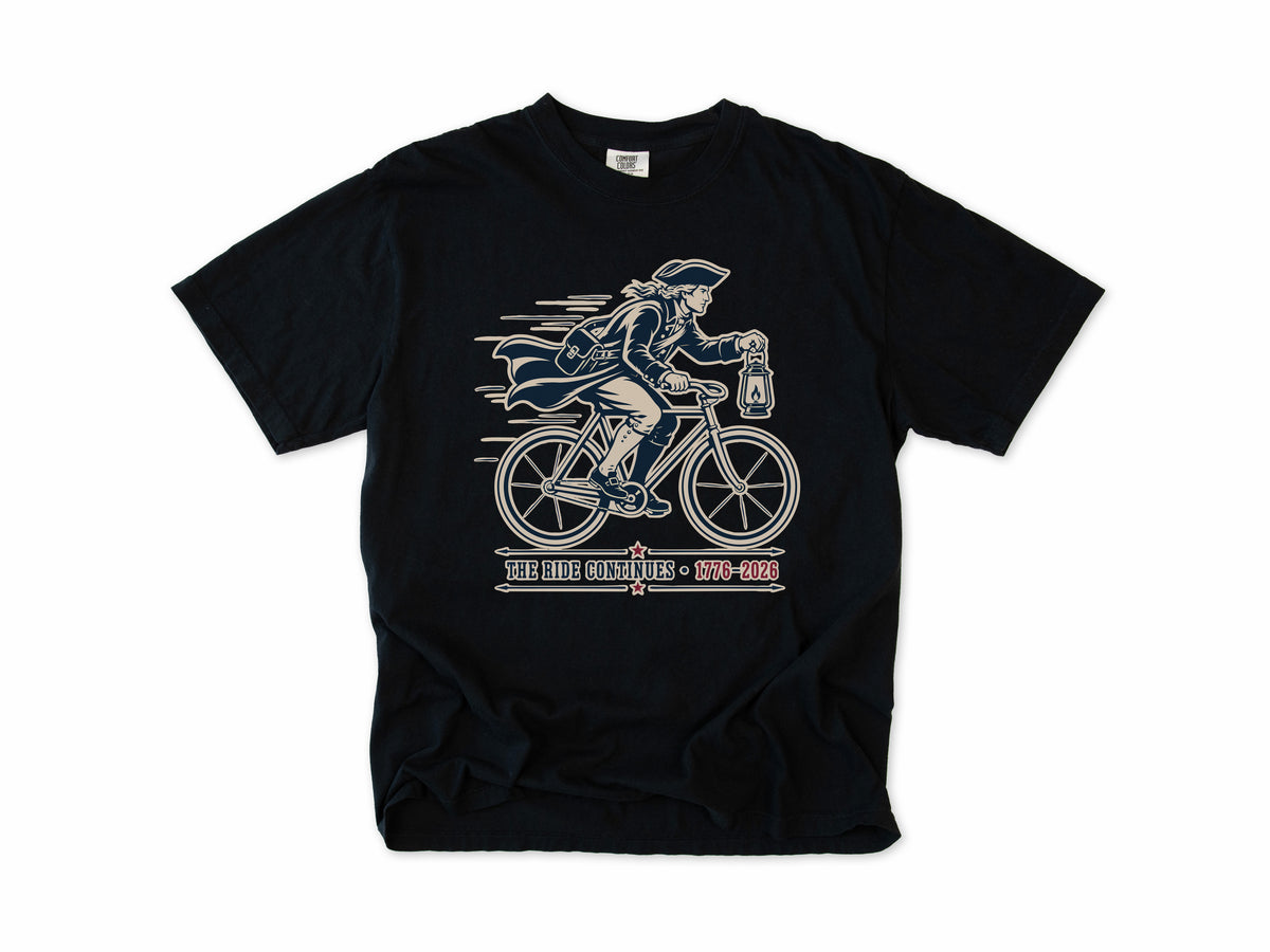 Cycling T-shirt in Black, Midnight Ride: a colonial rider with a lantern on a bike, America 250 and 4th of July gift for cyclists