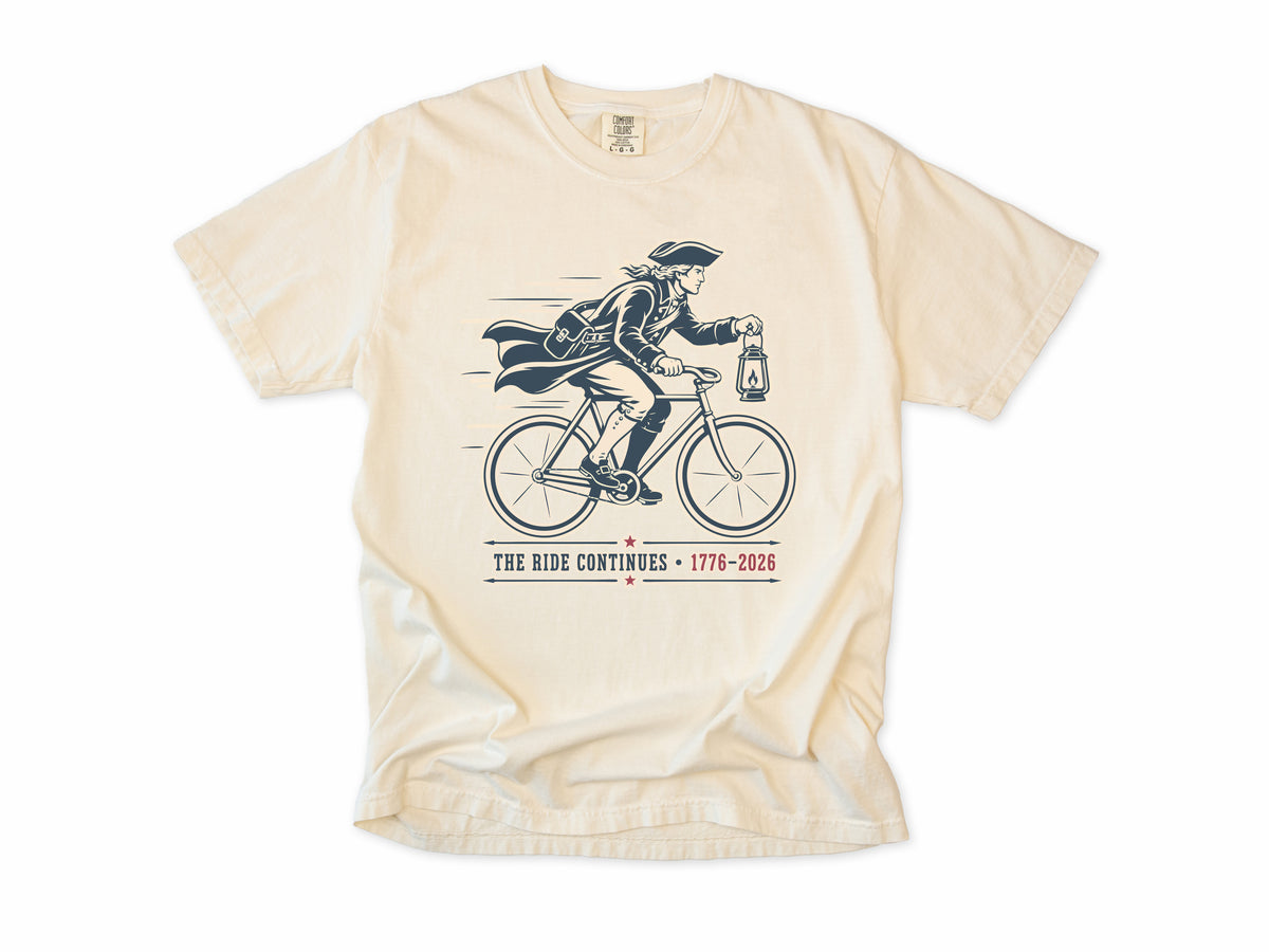 Cycling T-shirt in Ivory, Midnight Ride: a colonial rider with a lantern on a bike, America 250 and 4th of July gift for cyclists