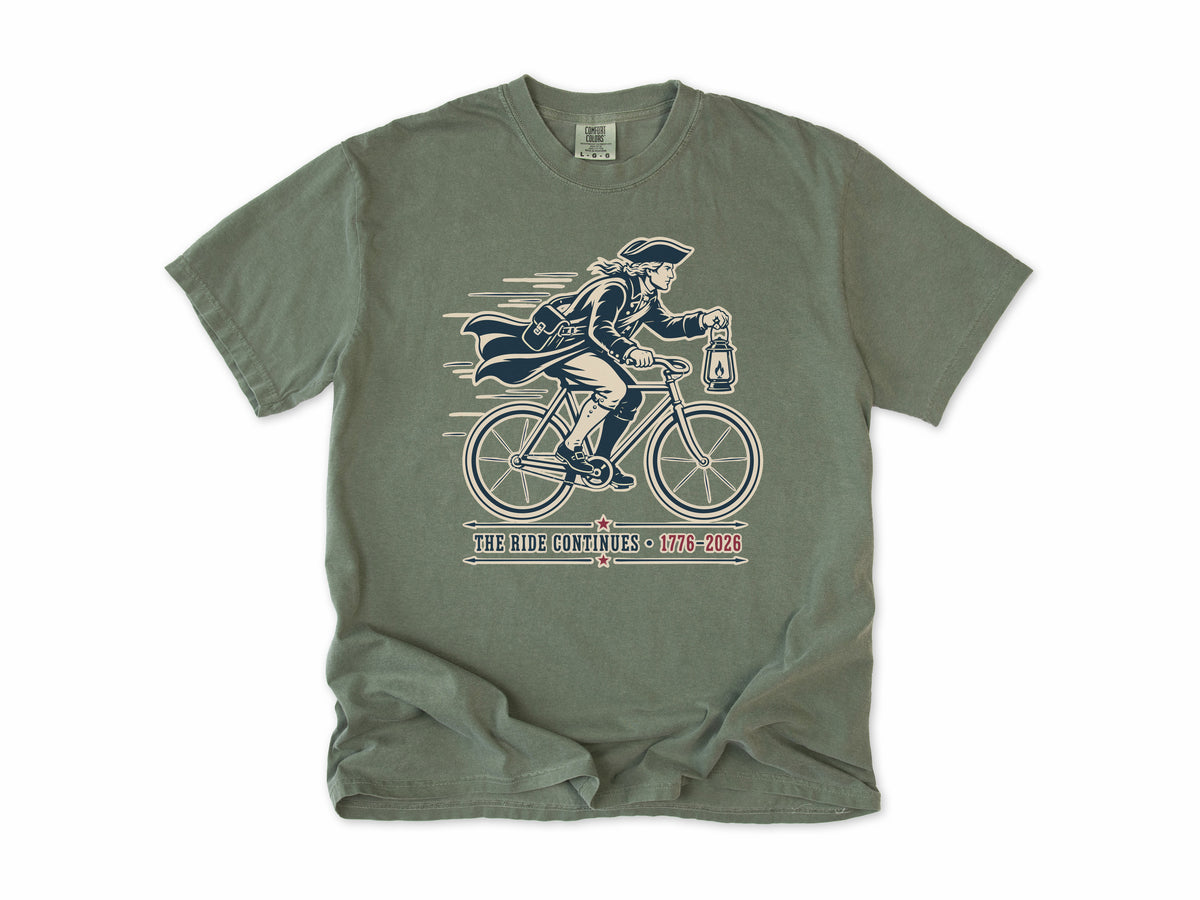 Cycling T-shirt in Moss, Midnight Ride: a colonial rider with a lantern on a bike, America 250 and 4th of July gift for cyclists
