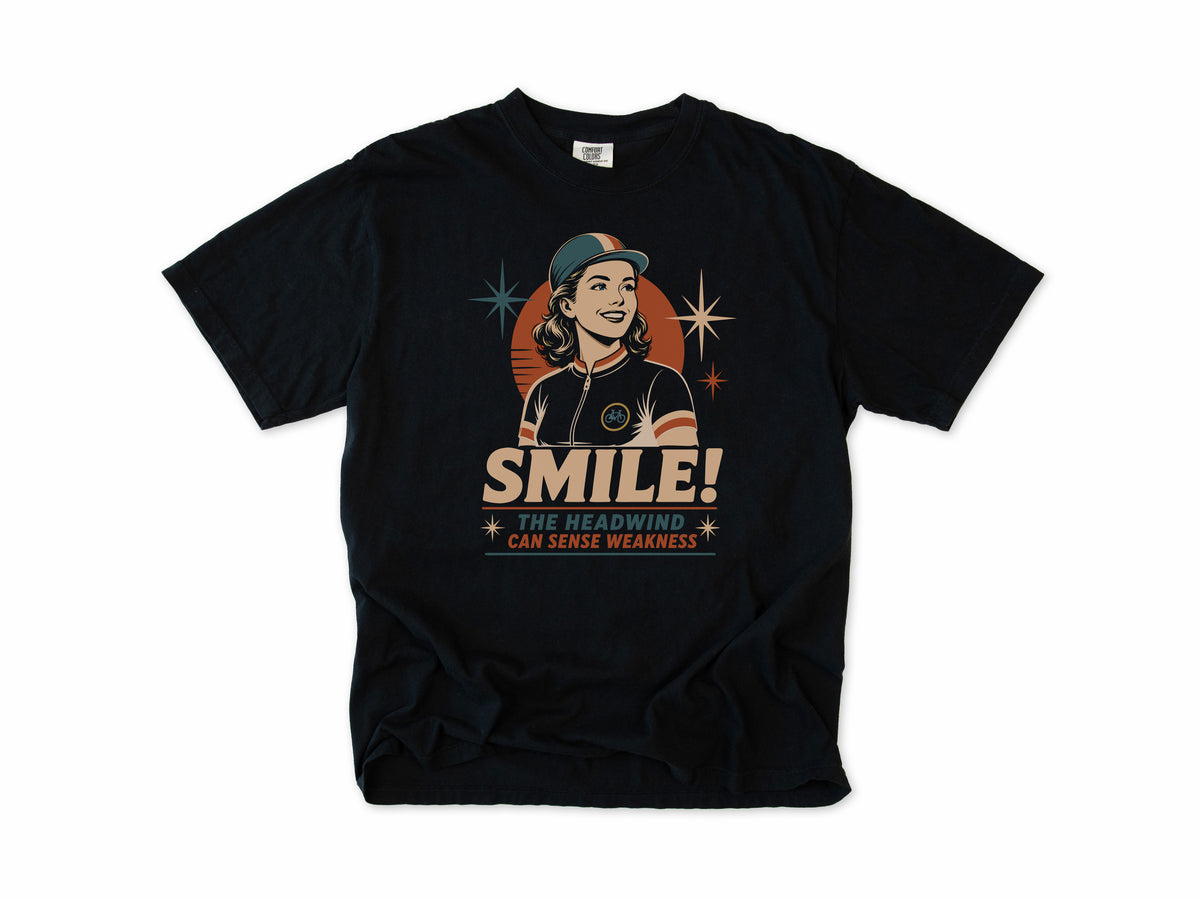 Funny cycling T-shirt in Black, a retro woman cyclist in a cap, 'Smile!', gift for a woman who cycles: mum, wife, sister, daughter, nan