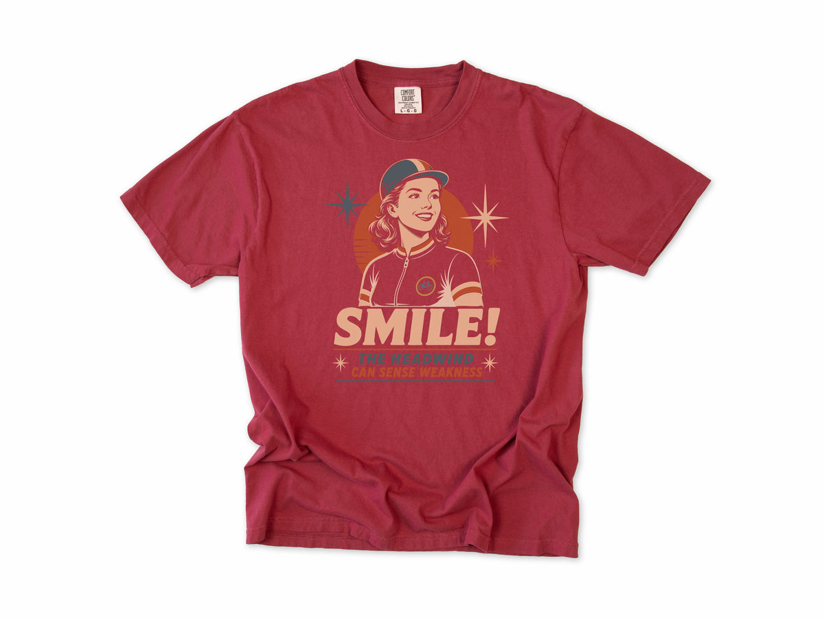 Funny cycling T-shirt in Chili, a retro woman cyclist in a cap, 'Smile!', gift for a woman who cycles: mum, wife, sister, daughter, nan