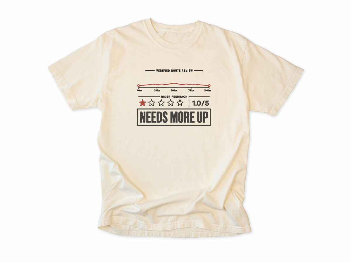 Funny cycling T-shirt in Ivory, a one-star route review, 'Needs More Up', for cyclists who love hills